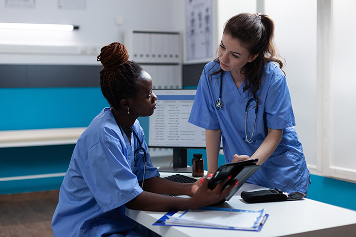 nurses working on paperwork